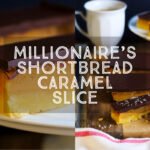 Millionaire's Shortbread sliced on a cutting board with a cup of coffee and a cake stand.