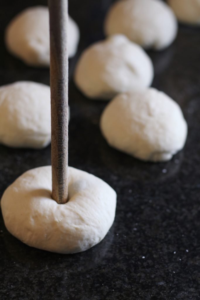Making the hole in bagel dough