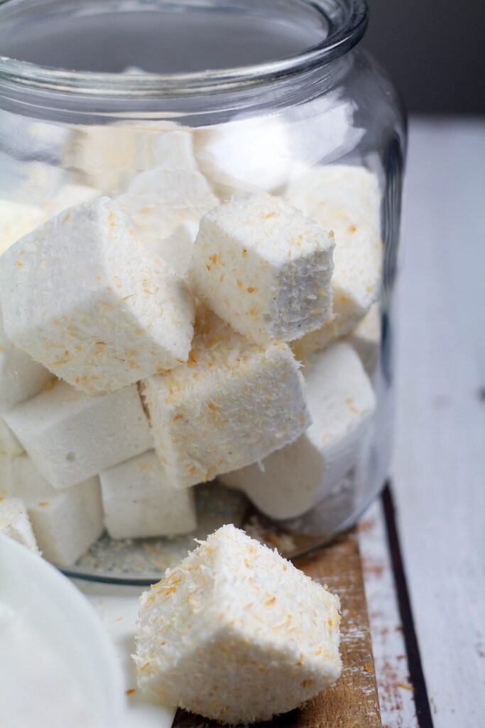 Homemade marshmallows in a large glass jar