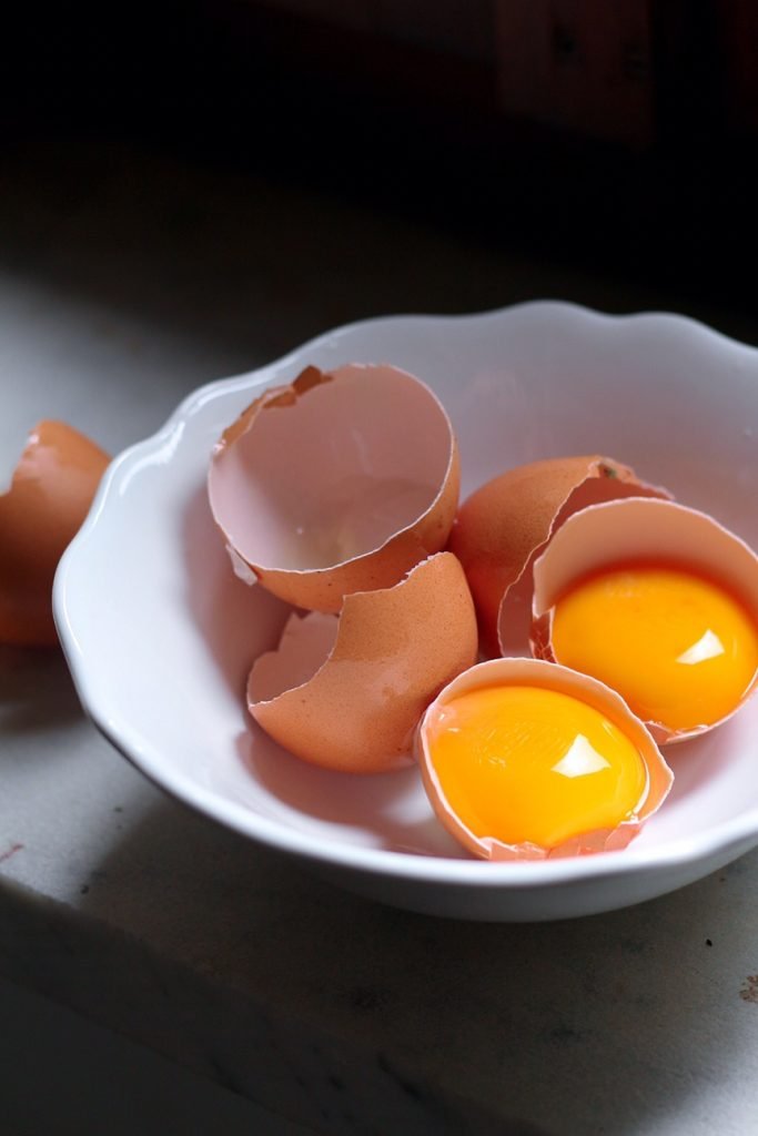 Eggs in Bowl showing yolks.