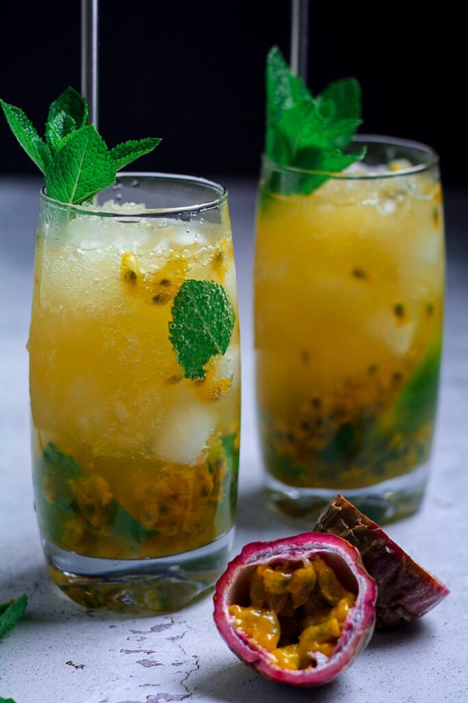 Passion fruit mojitos in tall glasses
