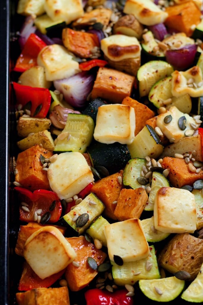 Summer Roast Vegetable Salad showing roasted halloumi mixed with the vegetables.