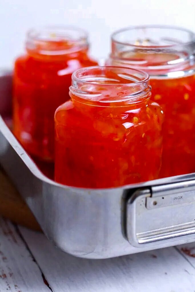 Spicy Red Pepper Jelly in jars.