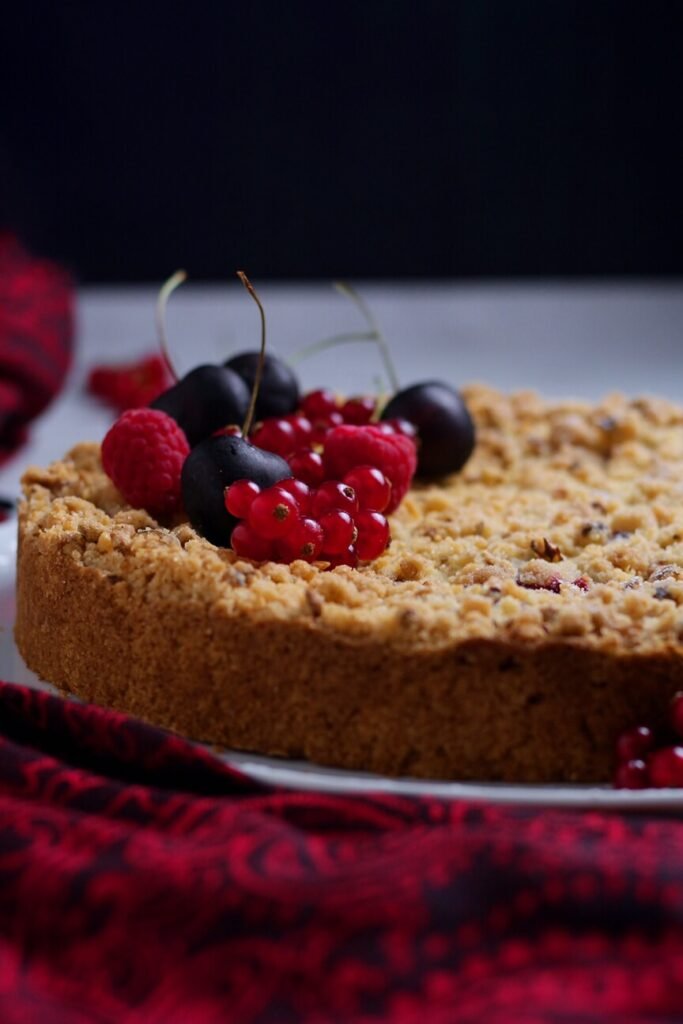 Red Currant Crumble Cake topped with fresh fruit