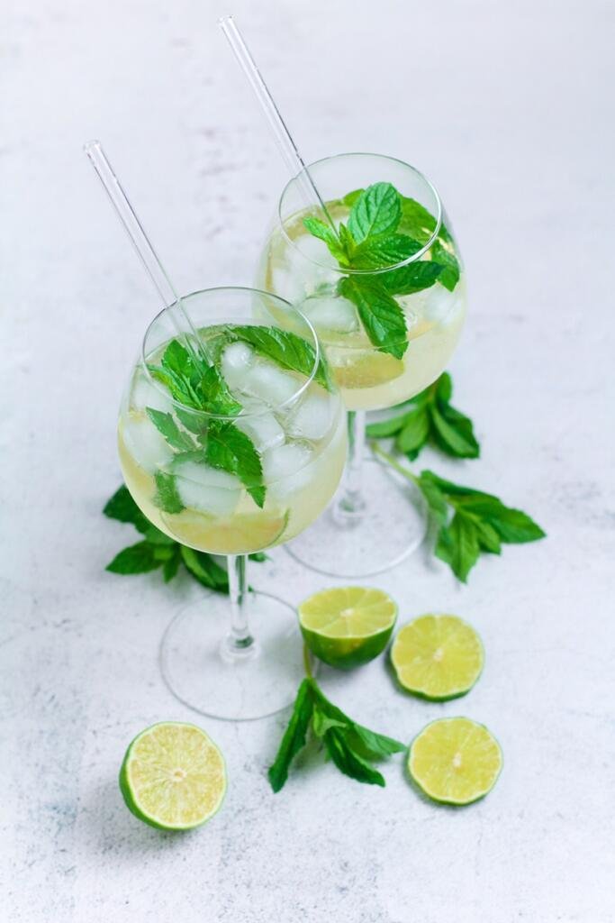 Wildly popular across Europe, the Hugo Spritz cocktail is a refreshing mixture of lime, mint, elderflower and sparkling wine. Served over ice in a large wine glass, this is the perfect drink on a sunny day.