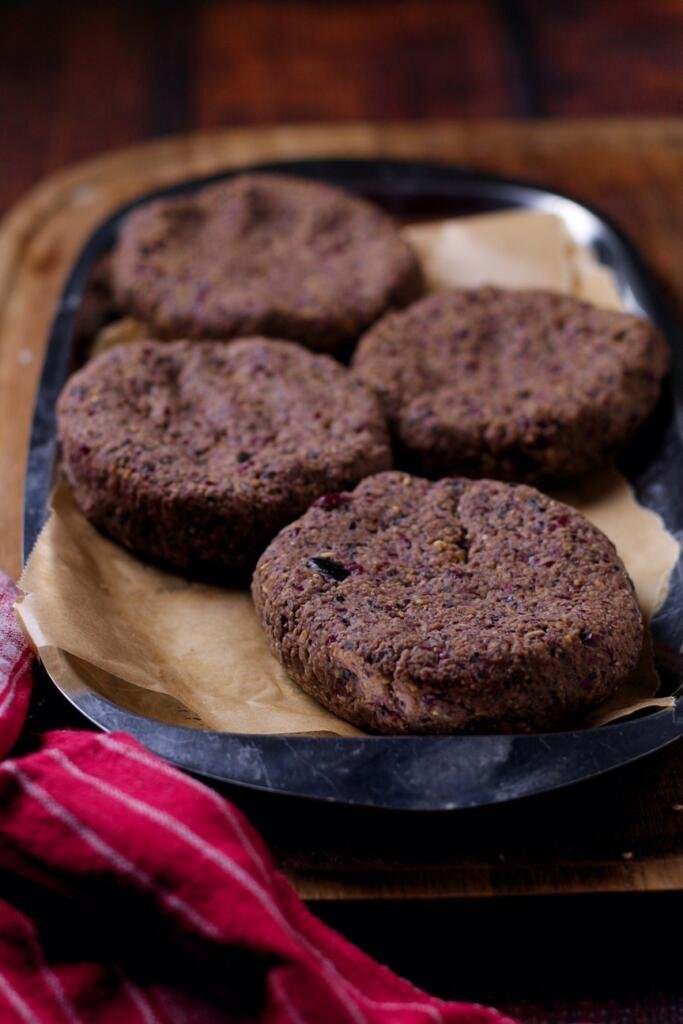 Rich, hearty and seriously tasty, Black Bean Veggie Burgers are so flavoursome and so good. Packed full of goodness with beans, oats, walnuts and sunflower seeds, these burgers are a real crowd-pleaser.