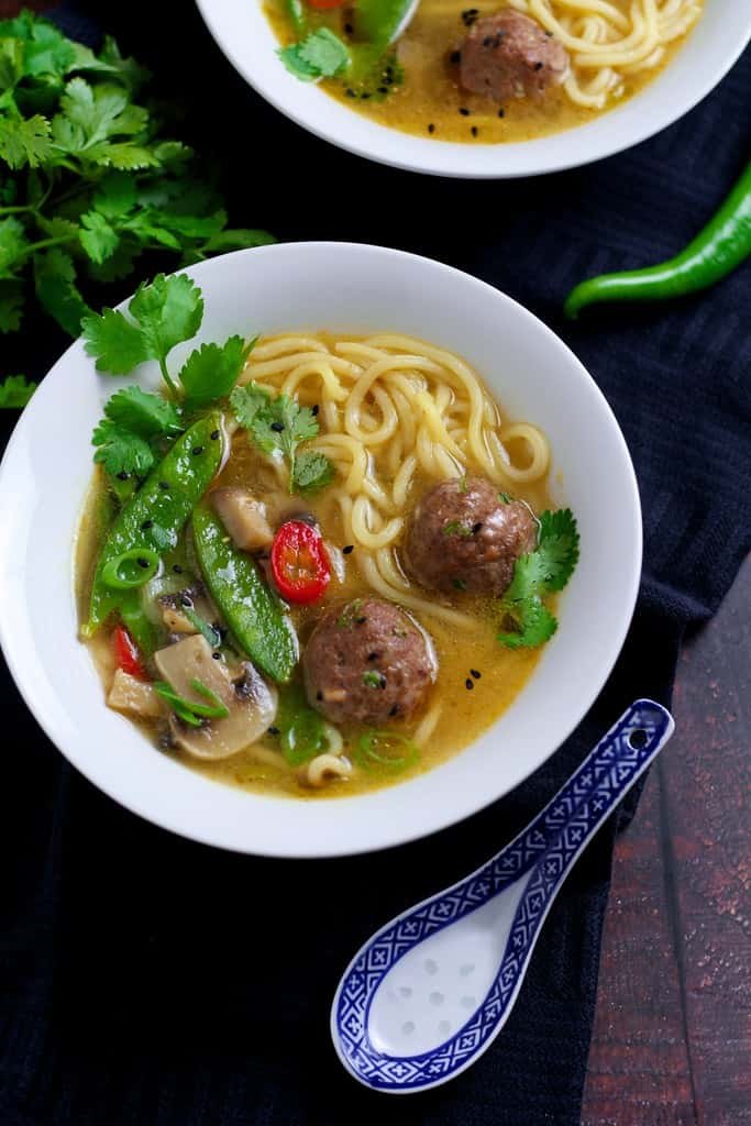 Spicy, fragrant and bursting with flavour, Asian inspired Pork Meatball  Soup with noodles will chase away the winter blues. Ready in under 30 minutes, it is ideal for a weeknight dinner.