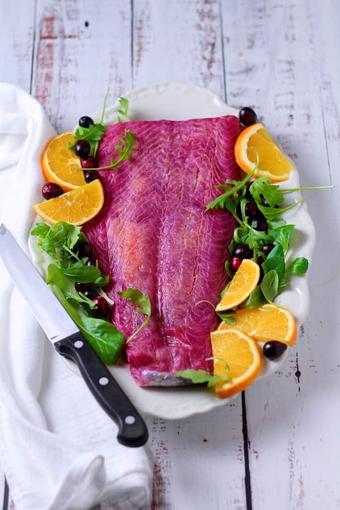 With beautifully bright colours Cranberry Cranberry Orange Cured Salmon is a wonderful dish to serve as a starter at your festive table. It’s so simple to make and home and delicious with a creamy horseradish sauce.