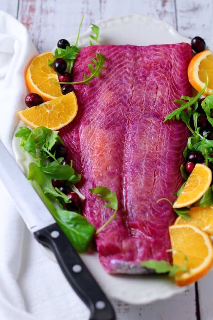 With beautifully bright colours Cranberry Orange Cured Salmon is a wonderful dish to serve as a starter at your festive table. It’s so simple to make and home and delicious with a creamy horseradish sauce.