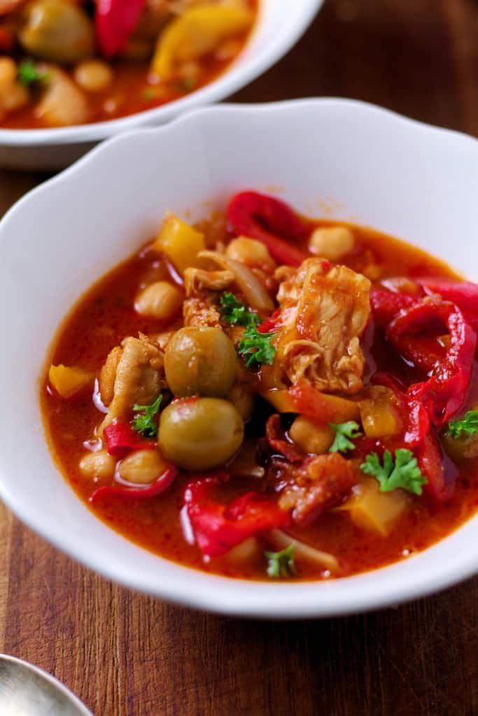 Spanish Style Chicken Stew is a wonderfully warming Spanish or North African inspired dish, loaded with chicken, spicy sausage, nutty chickpeas and sweet peppers. 