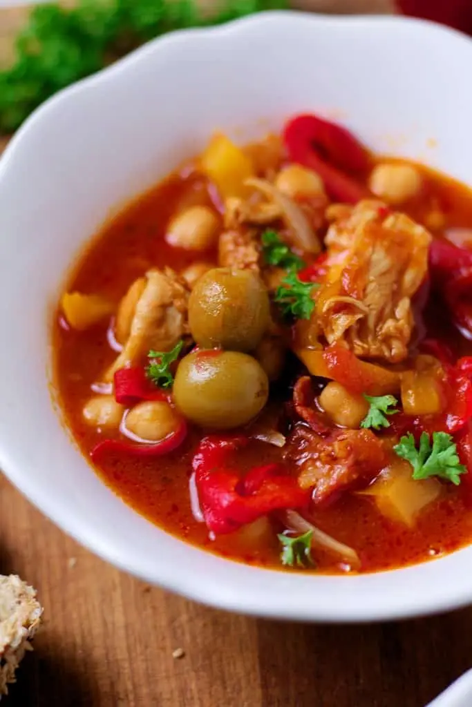 Spanish Style Chicken Stew is a wonderfully warming Spanish or North African inspired dish, loaded with chicken, spicy sausage, nutty chickpeas and sweet peppers. 