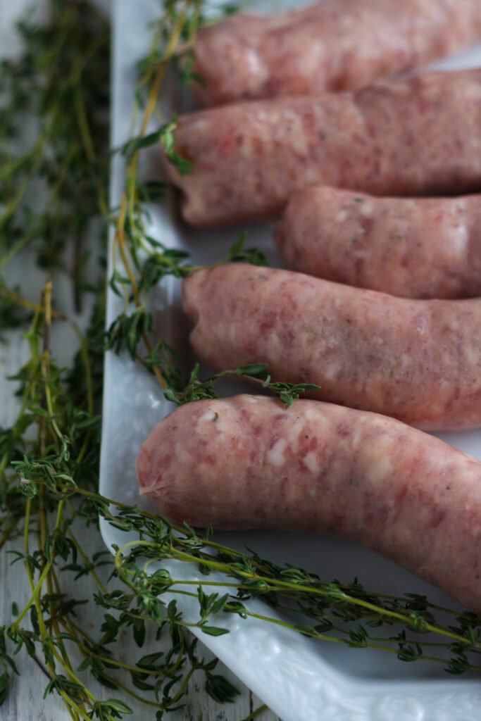 Sausages and thyme for devilled sausages.