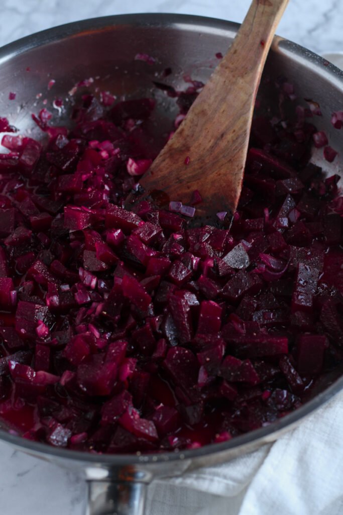 Chopped beetroot sauce in a frying pan for Beetroot and Feta Pasta