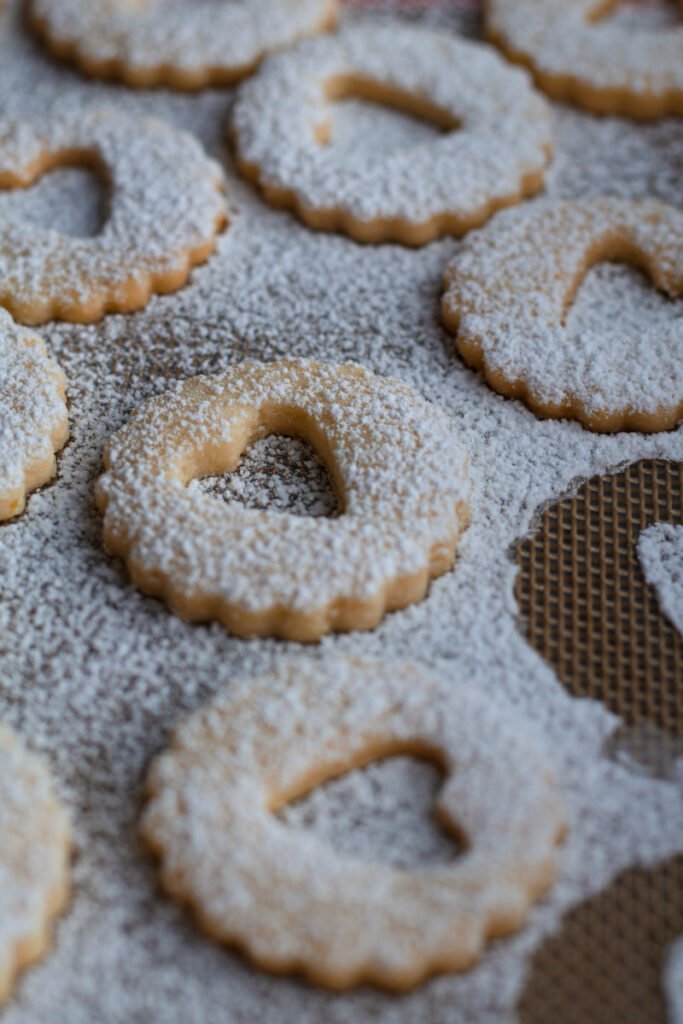 Spitzbuben cookie tops dusted with sugar