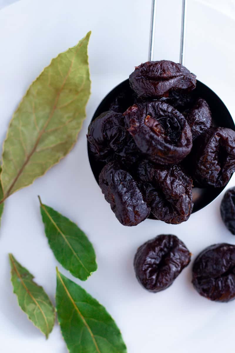 Prunes and bay leaves for Chicken Marbella