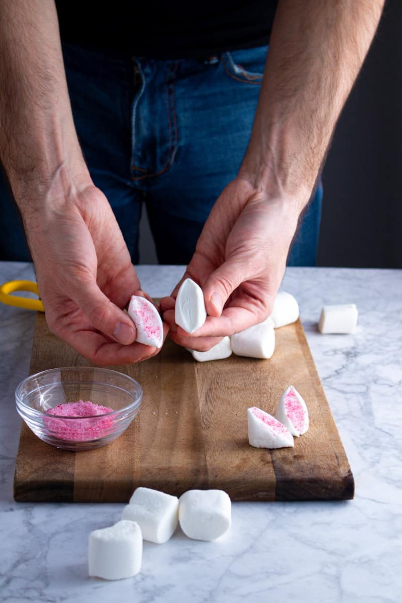 Cutting marshmallows for Easter Bunny Cupcakes