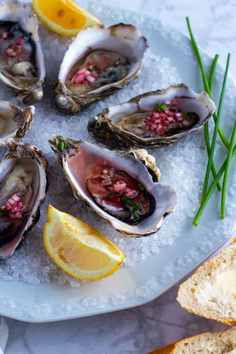 Fresh Oysters with Shallot Vinaigrette are truly one of life’s little luxuries. The contrast of creamy, briny oyster flesh with a tangy vinaigrette is a match made in culinary heaven and one I find completely irresistible.