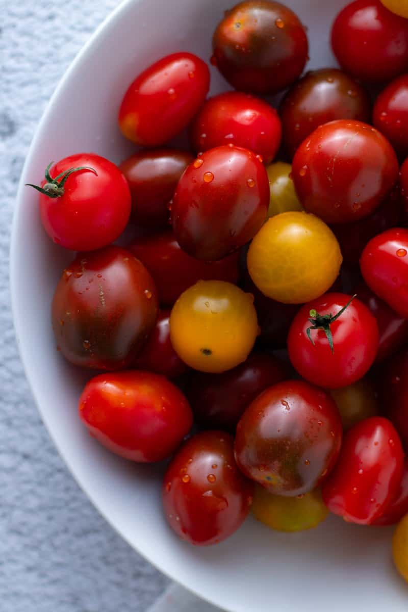 Mixed colour cherry tomatoes in a bowl