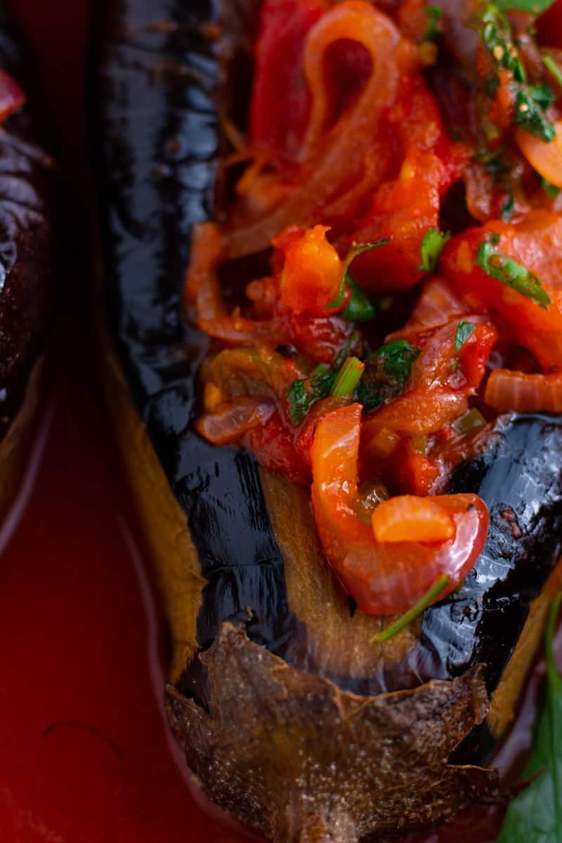A picture of Imam Bayildi, roast Turkish eggplants stuffed with tomatoes and onions