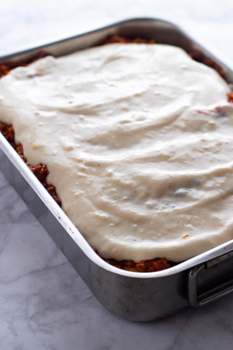 Cannelloni under a layer of ragu and bechamel