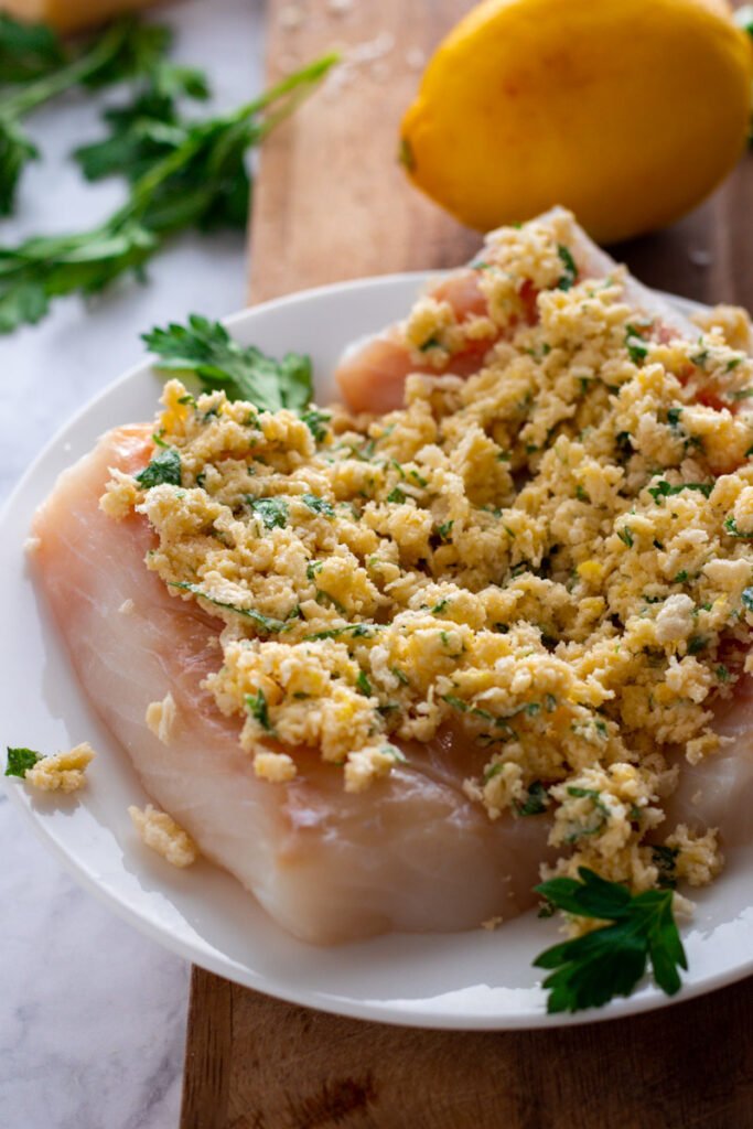 Cod with breadcrumb topping, unbaked.