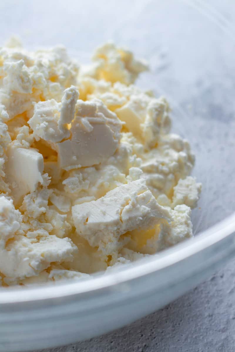 Feta and cottage cheese in a bowl.