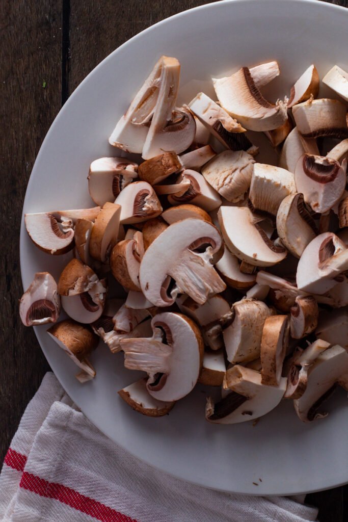 Sliced mushrooms on a plate.
