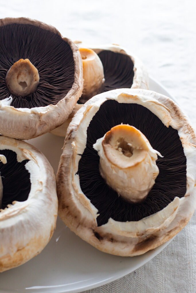 Portobello mushrooms on a plate.