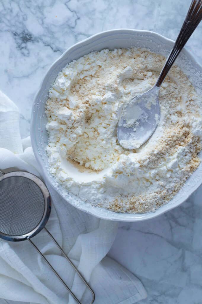 Flour and almond flour in a bowl.