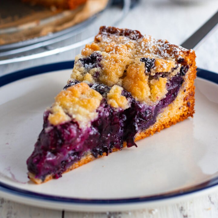 Blueberry Streusel Cake slice on a plate.