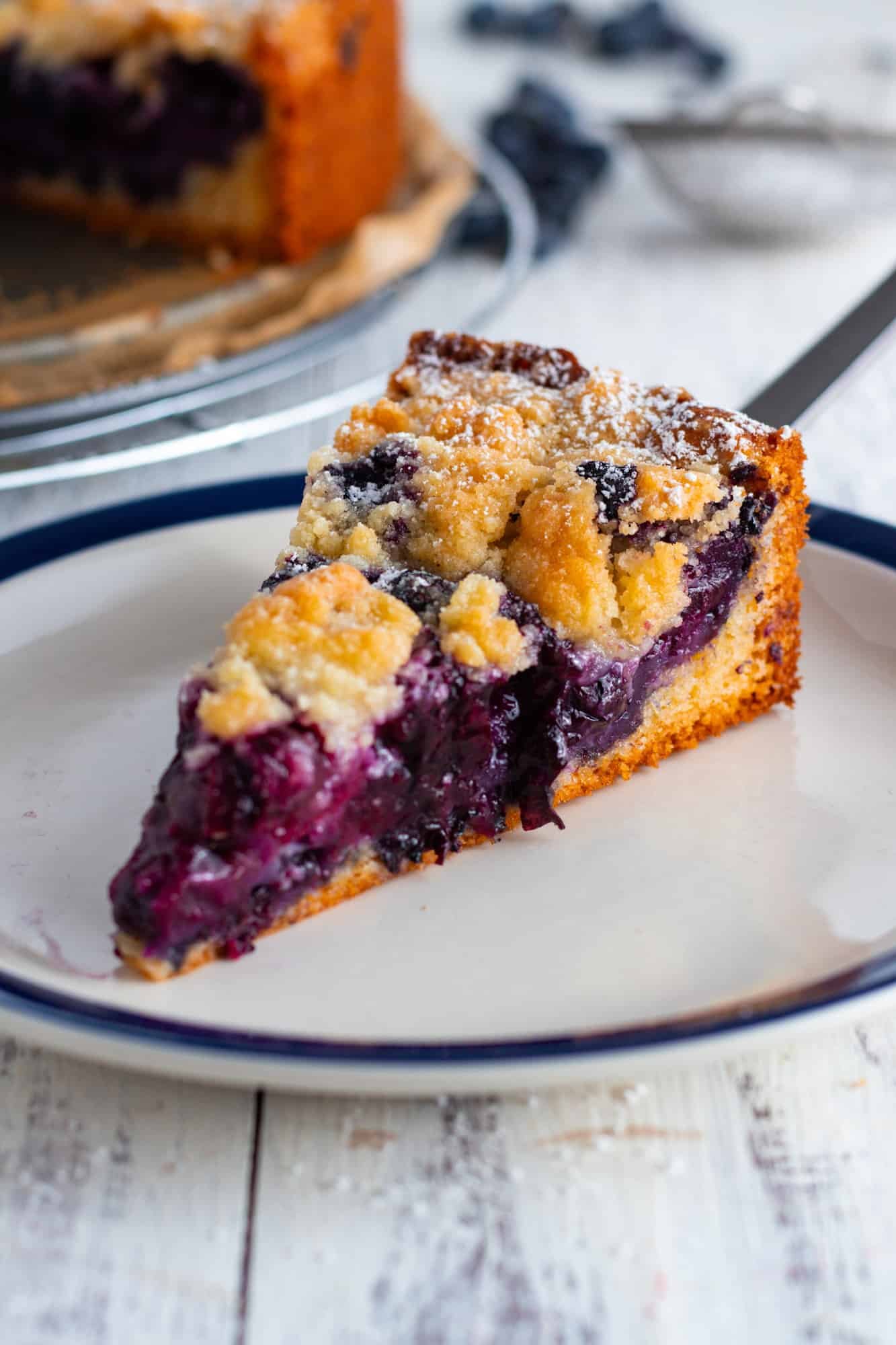 Blueberry Streusel Cake slice on a plate.