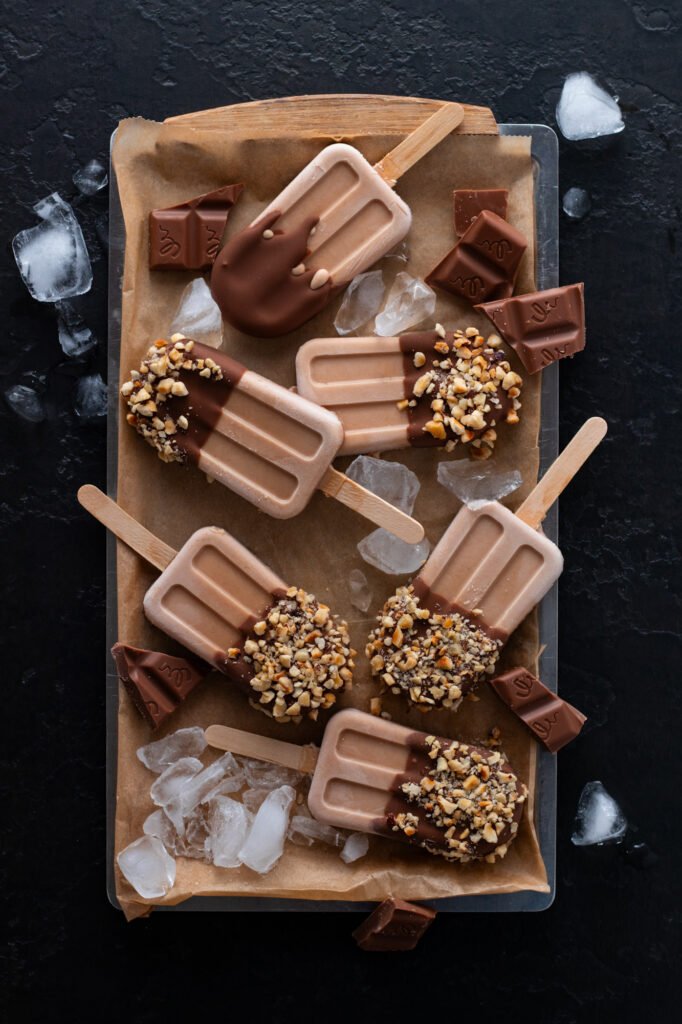Chocolate Popsicles on a tray.