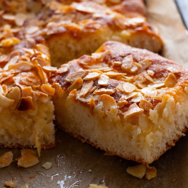 German Butter cake or Butterkuchen with a slice cut to show interior.