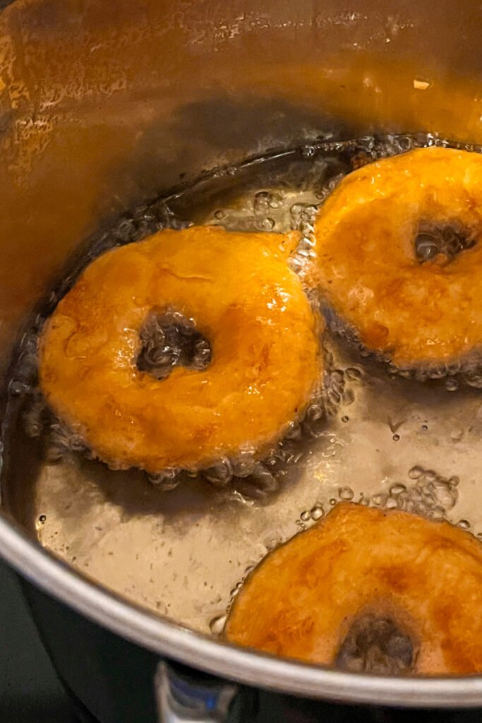 Apple rings frying in oil.