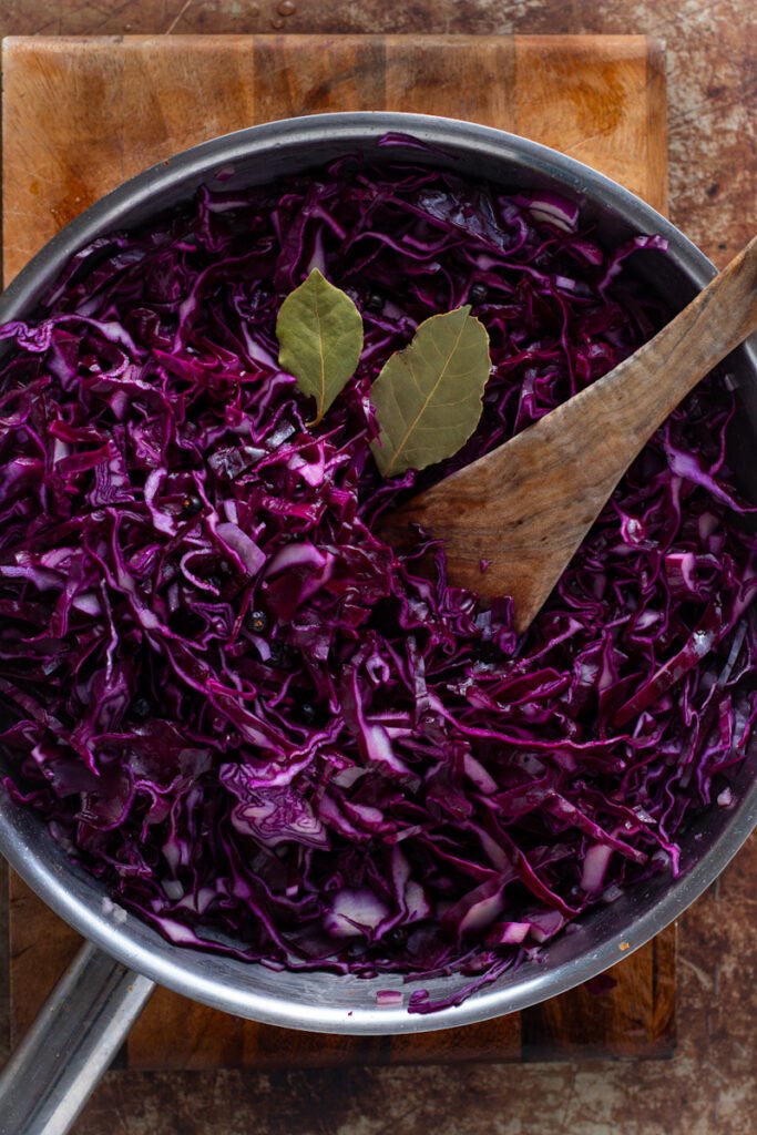 A saucepan with braised red cabbage in it.