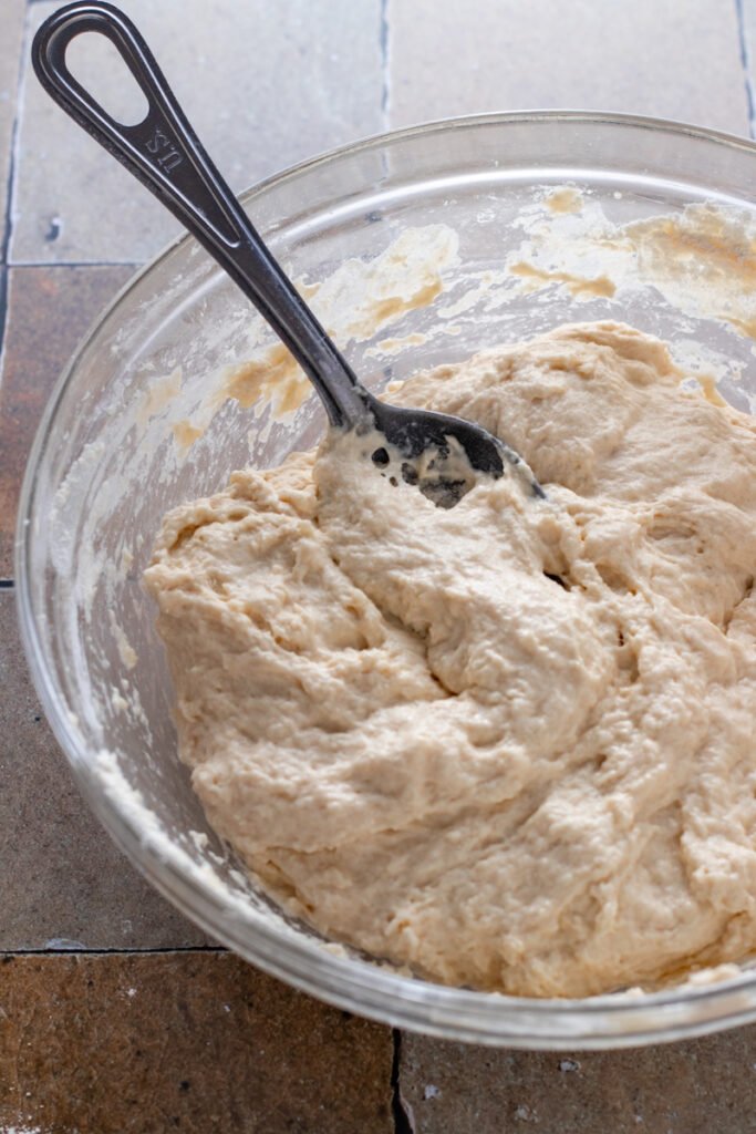 Shaggy dough in a mixing bowl.